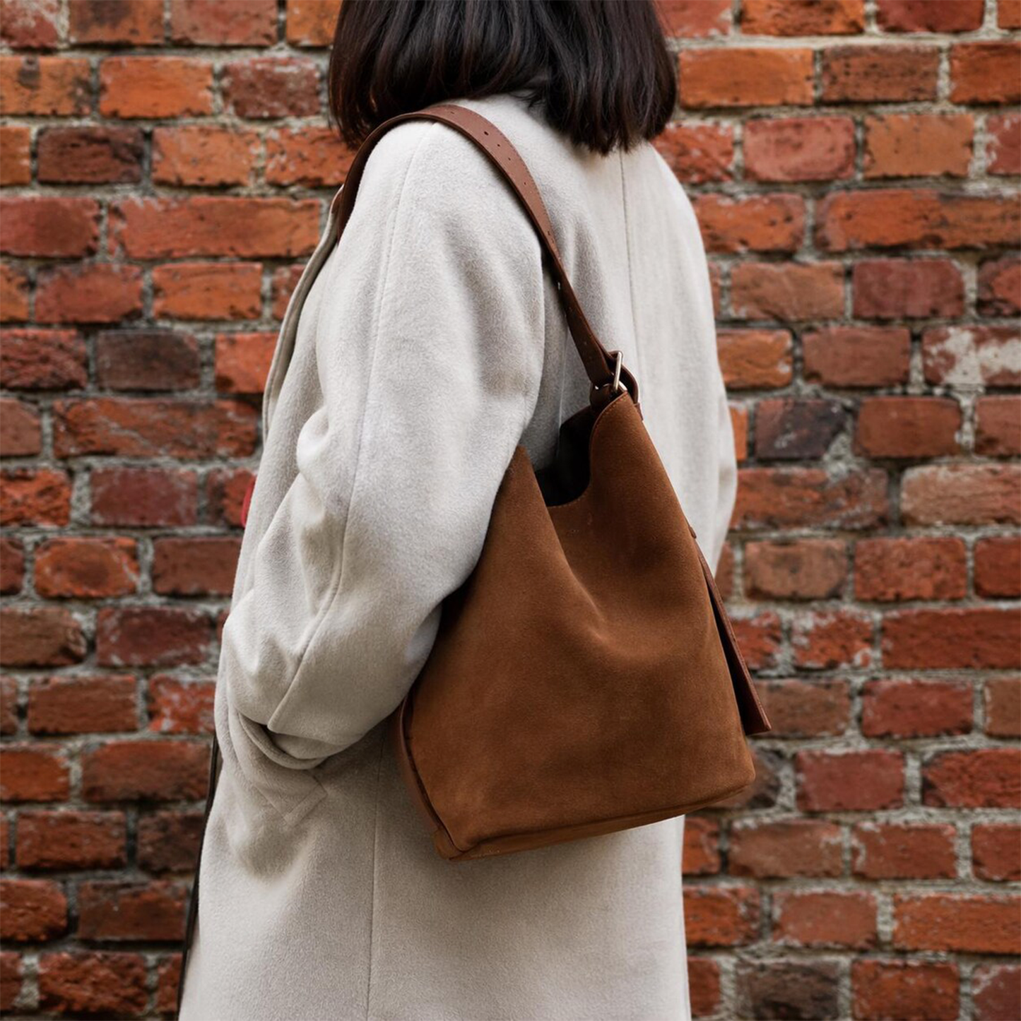 Chestnut Matte Fuzzy Slouchy Bucket Bag With Wide Buckle Fastened Hanging Strap, Auxiliary Opening Tie Tab And Roomy Unlined Inner Compartment