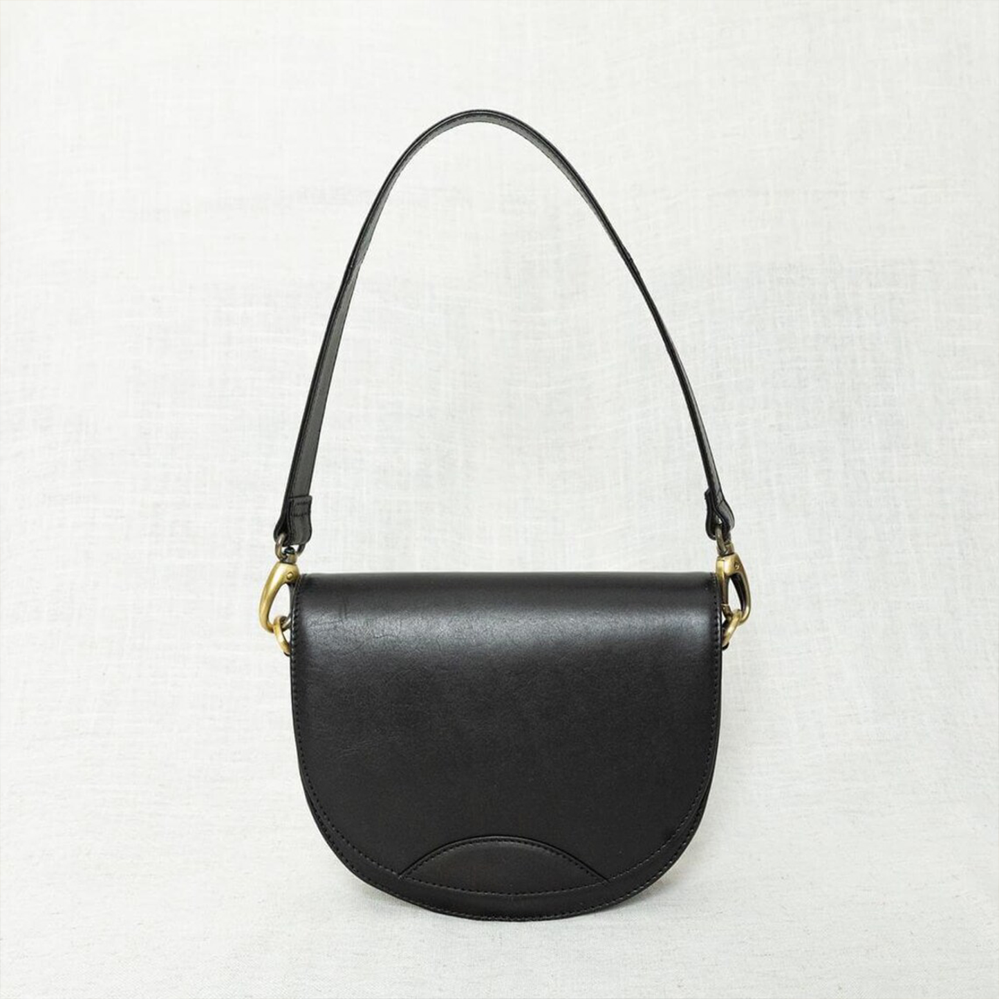 Dual-Tone Layered Half-Moon Saddle Pouch With Golden Swivel Clasp Hardware, Curved Flap Stitch Detailing And Single Slim Shoulder Hanging Strip