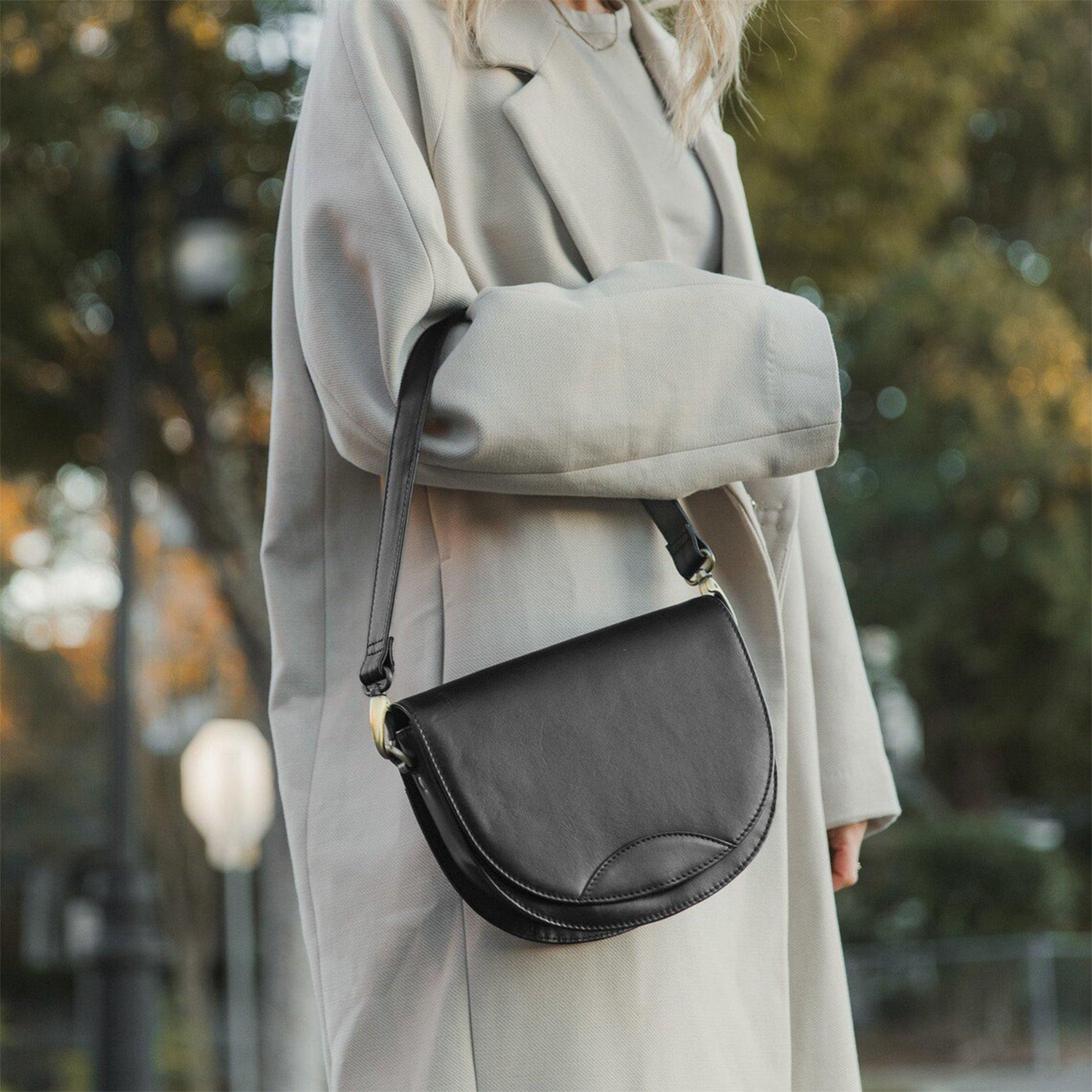 Dual-Tone Layered Half-Moon Saddle Pouch With Golden Swivel Clasp Hardware, Curved Flap Stitch Detailing And Single Slim Shoulder Hanging Strip