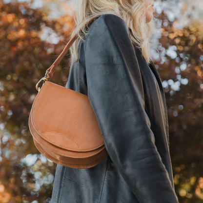 Dual-Tone Layered Half-Moon Saddle Pouch With Golden Swivel Clasp Hardware, Curved Flap Stitch Detailing And Single Slim Shoulder Hanging Strip